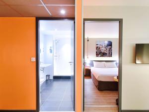 Krevet ili kreveti u jedinici u okviru objekta ibis Styles Lyon Centre Confluence