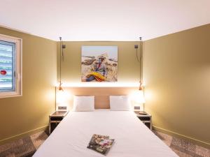 Krevet ili kreveti u jedinici u okviru objekta ibis Styles Lyon Centre Confluence