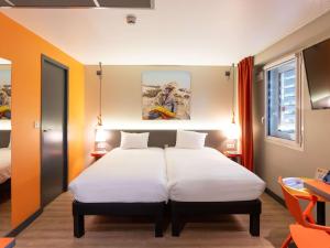 Krevet ili kreveti u jedinici u okviru objekta ibis Styles Lyon Centre Confluence