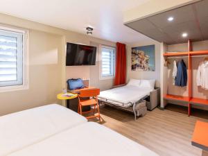 Krevet ili kreveti u jedinici u okviru objekta ibis Styles Lyon Centre Confluence