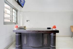 TV a/nebo společenská místnost v ubytování Hotel O YOUR RESIDENCY