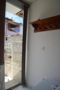 Fotografie z fotogalerie ubytování Suíte aconchegante em Paraty v destinaci Paraty