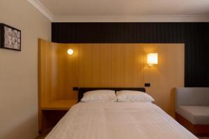 Mu S Boutique Motel "Matthew Flinders"客房内的一张或多张床位