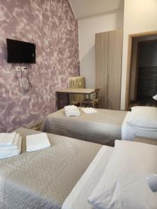 Postel nebo postele na pokoji v ubytování Casa Roxana