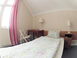 Postel nebo postele na pokoji v ubytování BasicRooms Hotel