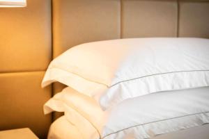 Postel nebo postele na pokoji v ubytování Hilton Minneapolis Bloomington