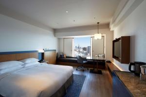 Letto o letti in una camera di Hilton Nagoya Hotel