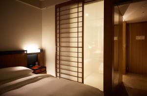Letto o letti in una camera di Hilton Nagoya Hotel