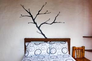 Postel nebo postele na pokoji v ubytování Hotel Karukera