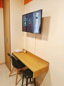 TV a/nebo společenská místnost v ubytování Studio Santanes Centro RJ