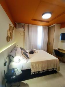 Postel nebo postele na pokoji v ubytování Studio Santanes Centro RJ