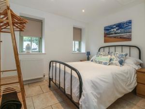 Giường trong phòng chung tại An Garth +11 ảnh