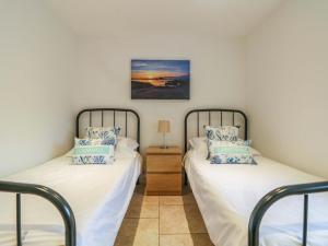 Giường trong phòng chung tại An Garth