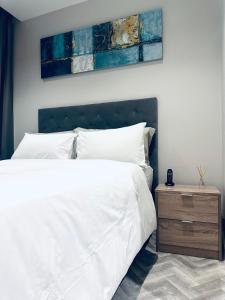 Postel nebo postele na pokoji v ubytování 1 Bedroom Modern Apartment Foreshore Place CBD + 9 fotografií