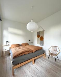 Postel nebo postele na pokoji v ubytování Ferienhaus Stranden Westfehmarn