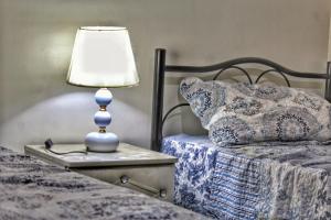 Una cama o camas en una habitación de Yassers Residence