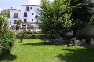 Zahrada ubytování Hostal Rural Poqueira