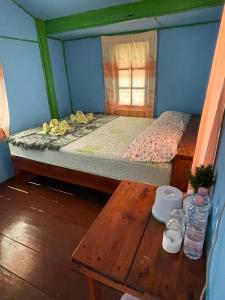 Voodi või voodid majutusasutuse Koh Mak Green View Resort toas