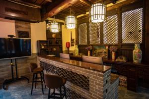 Lounge nebo bar v ubytování Pingyao Grand Theater Guild Hall East Garden