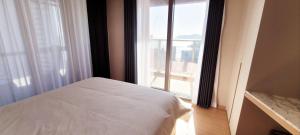 Postel nebo postele na pokoji v ubytování Elbon the stay with A1