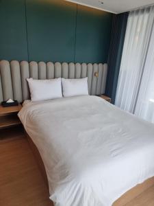 Postel nebo postele na pokoji v ubytování Elbon the stay with A1