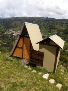 a tiny house on top of a hill at Cabañas M L el cocuy Boyacá in El Cocuy +35 photos
