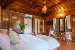 Ένα ή περισσότερα κρεβάτια σε δωμάτιο στο ama Stays & Trails Aquabliss ,Alleppey +72 φωτογραφίες