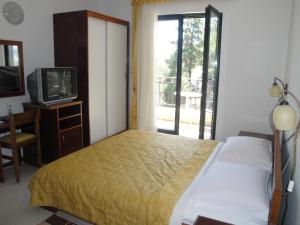 Кровать или кровати в номере Hotel Danica