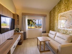 TV a/nebo společenská místnost v ubytování Grand Sirenis Punta Cana Resort & Aquagames - All Inclusive
