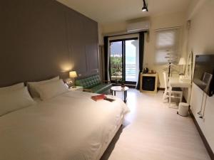 Postel nebo postele na pokoji v ubytování Yuncourt B&B