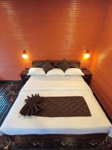 Postel nebo postele na pokoji v ubytování Betel Brooks Resort