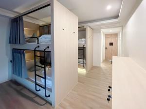 Postel nebo postele na pokoji v ubytování YAA Hostel
