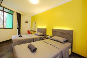 Postel nebo postele na pokoji v ubytování Parkland Hotel