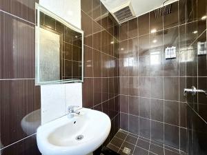 Koupelna v ubytování Park Hotel + 37 fotografií