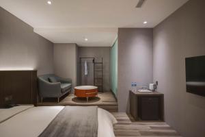 TV a/nebo společenská místnost v ubytování Fun Stay Inn Ximen