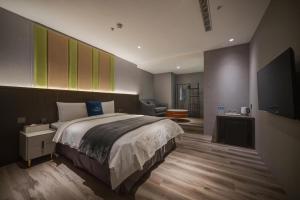 TV a/nebo společenská místnost v ubytování Fun Stay Inn Ximen