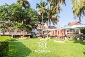 Colva Blossom 2BHK Apartment with Gym,Wifi and 5min walk to the famous Colva Beach外面的花园