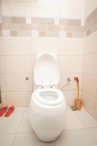 Koupelna v ubytování Flamarc Hotel + 27 fotografií