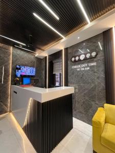 TV a/nebo společenská místnost v ubytování Hotel National - Grant Road