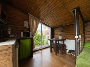 Kuchyň nebo kuchyňský kout v ubytování harmony.of.mountains twin room