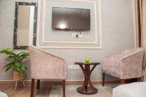 Posezení v ubytování Flamarc Hotel