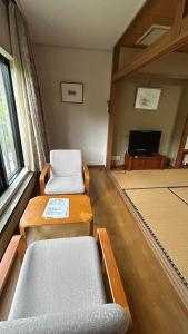 Χώρος καθιστικού στο Hakone Fairy Hotel