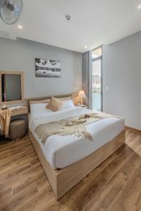 Voodi või voodid majutusasutuse Gia Nguyễn Hotel Dalat toas
