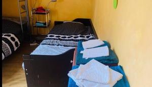 Posteľ alebo postele v izbe v ubytovaní La petite maison de Paule