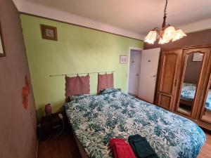 Posteľ alebo postele v izbe v ubytovaní La petite maison de Paule