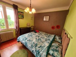 Posteľ alebo postele v izbe v ubytovaní La petite maison de Paule