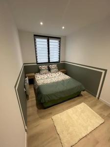 Ένα ή περισσότερα κρεβάτια σε δωμάτιο στο Luxueux 3 Chambres Tout Confort +1 φωτογραφίες