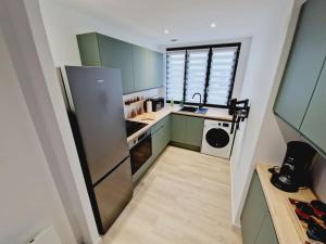 Η κουζίνα ή μικρή κουζίνα στο Luxueux 3 Chambres Tout Confort