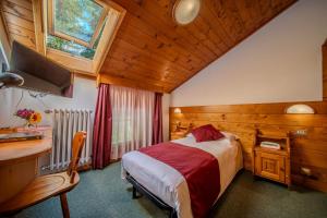 Postel nebo postele na pokoji v ubytování Hotel il Cardo
