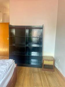 Ένα ή περισσότερα κρεβάτια σε δωμάτιο στο Yoga House Apartments
